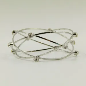Criss-cross statement bangle with feature crystals
