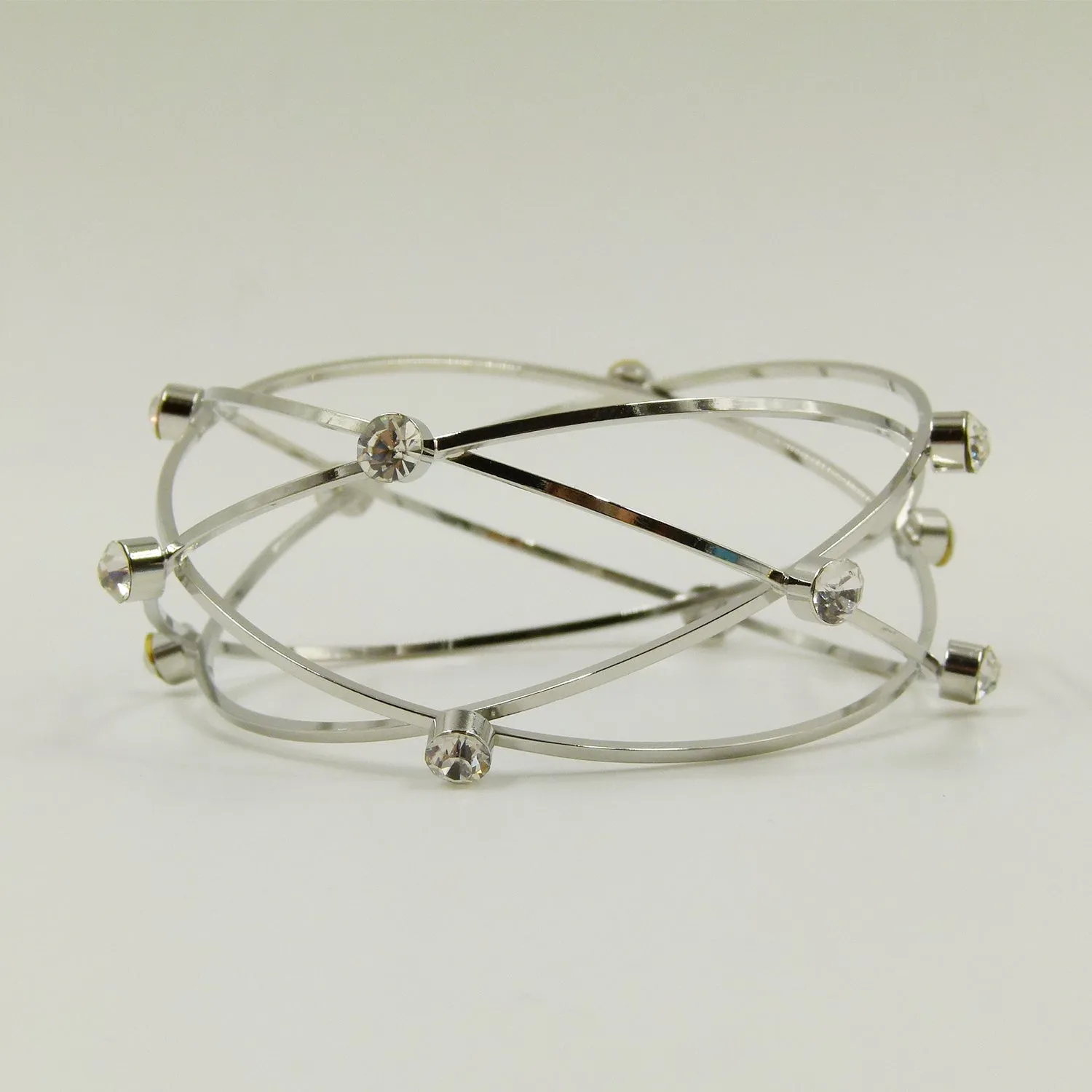 Criss-cross statement bangle with feature crystals
